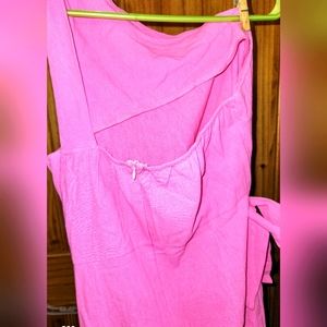 One shoulder pink wrap dress.